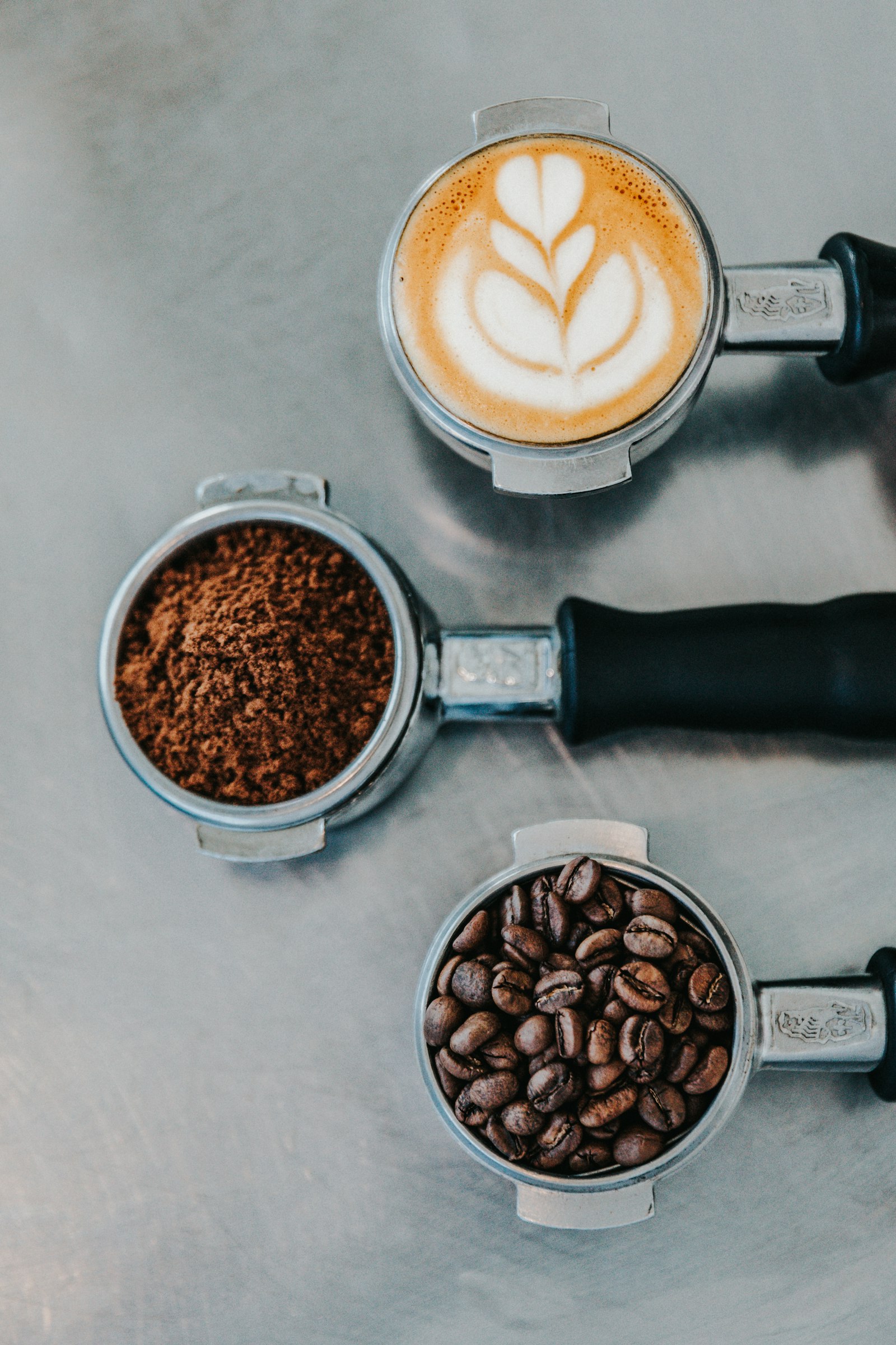 Coffee from whole beans to ground coffee to finished cup